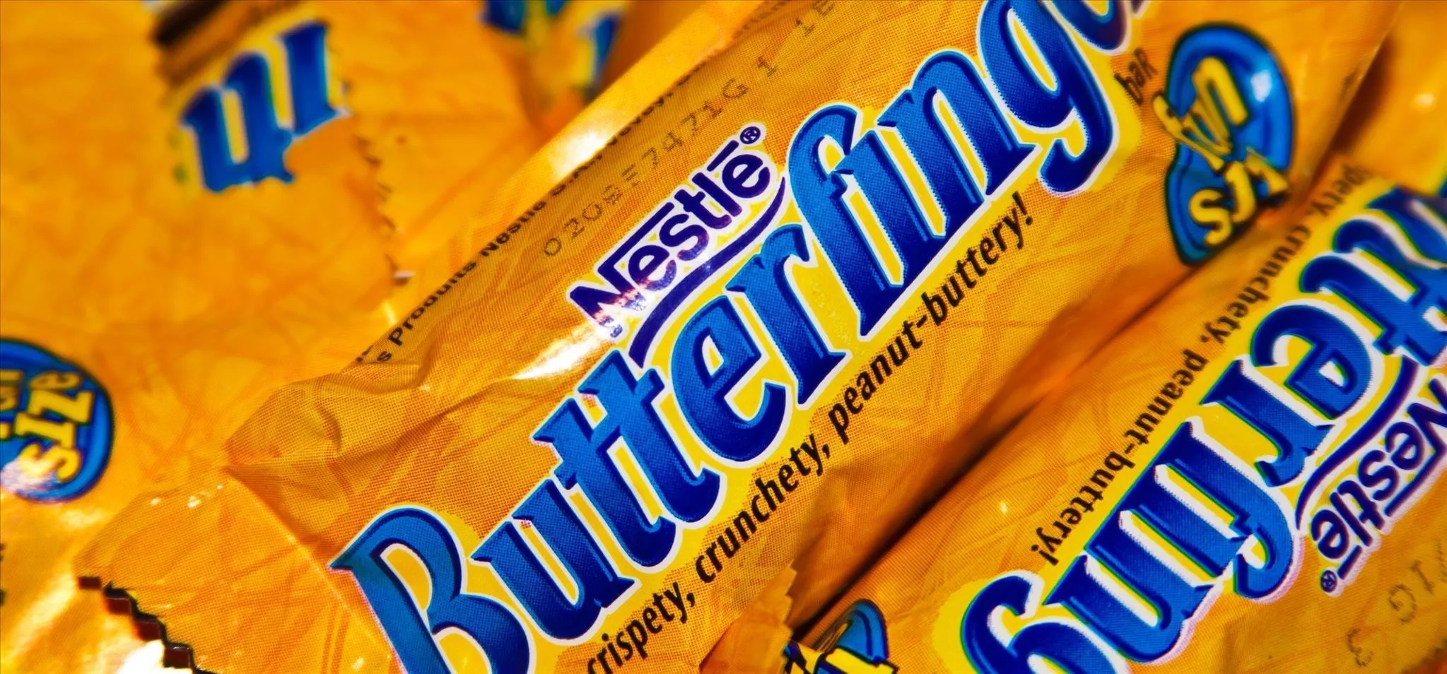 Butterfinger candy bars in yellow packaging.