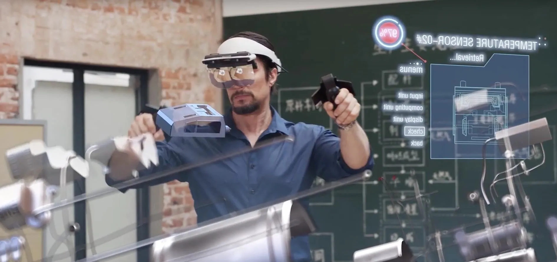 A person using augmented reality technology to interact with digital information in a professional setting.