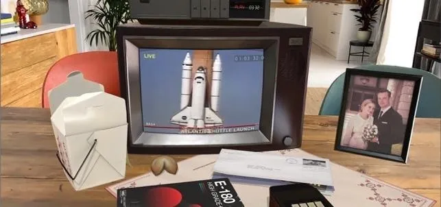 Vintage television displaying a space shuttle launch, surrounded by various items including a photo frame, magazines, and envelopes on a desk.